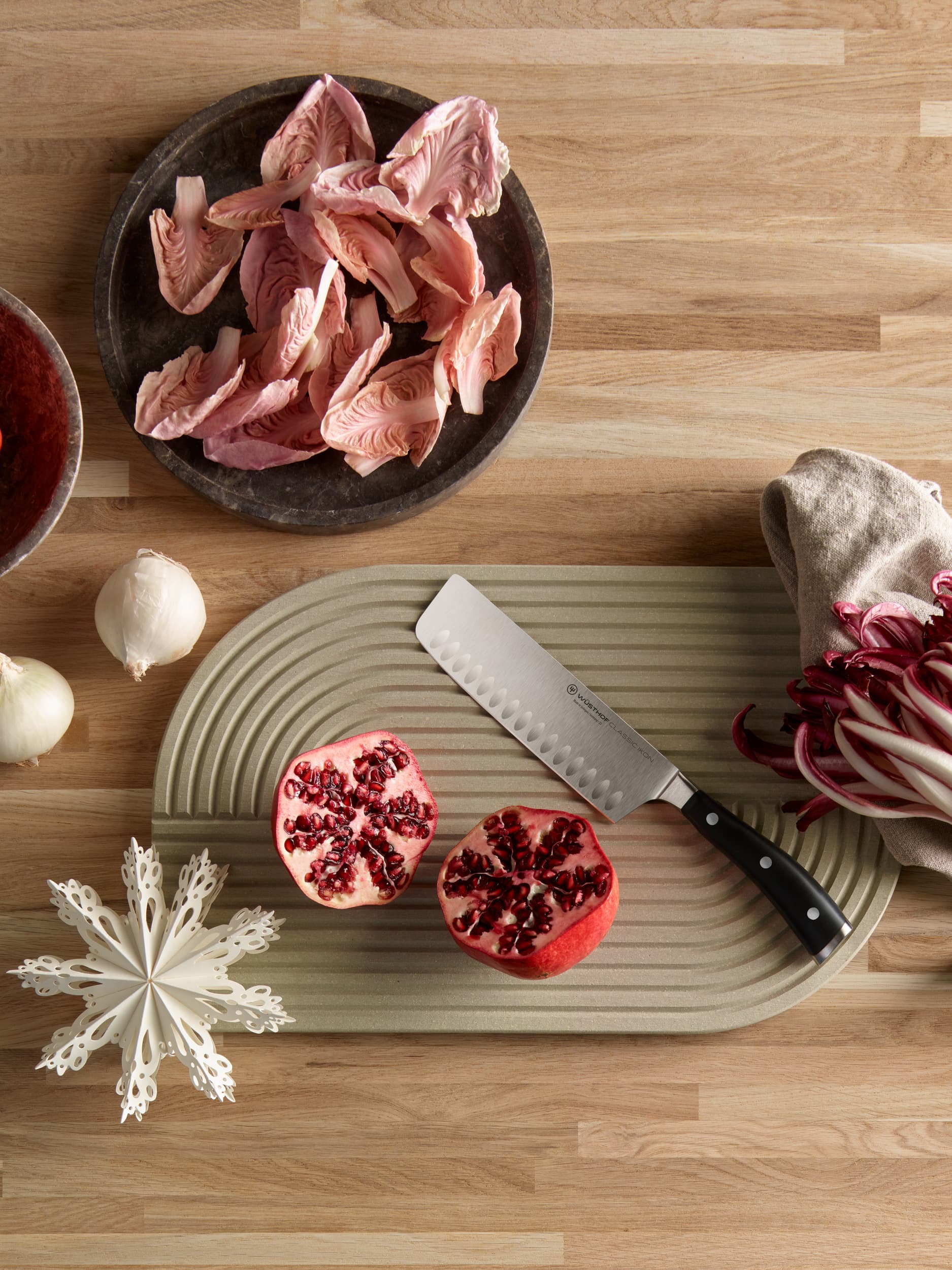 classic ikon nakiri near pomegranate and holiday decor