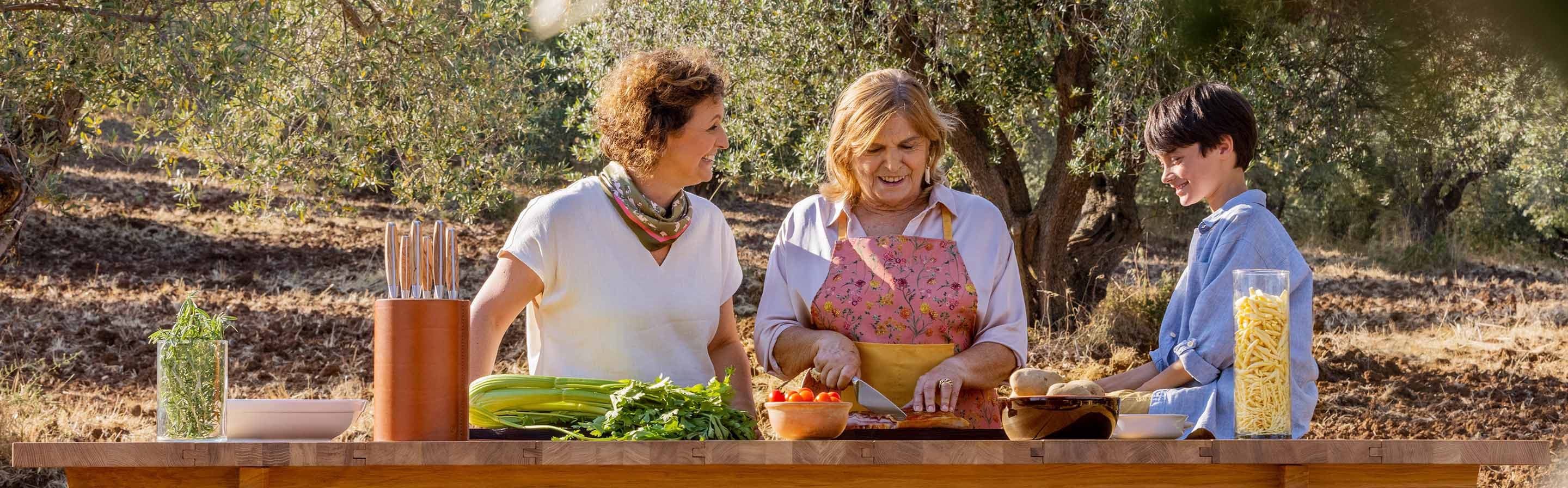 image of nona, daughter, and grandson at the wüsthof chef's table
