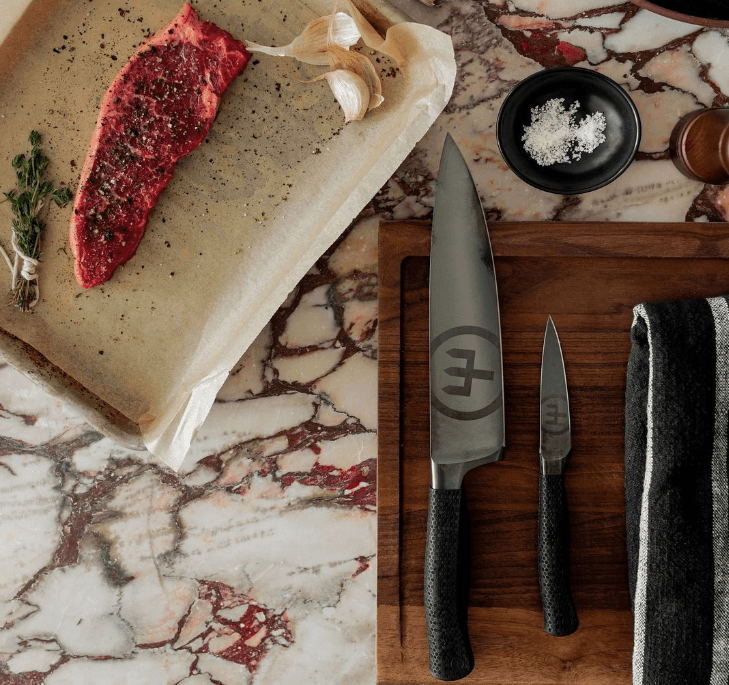 WÜSTHOF knives near raw meat and seasoning