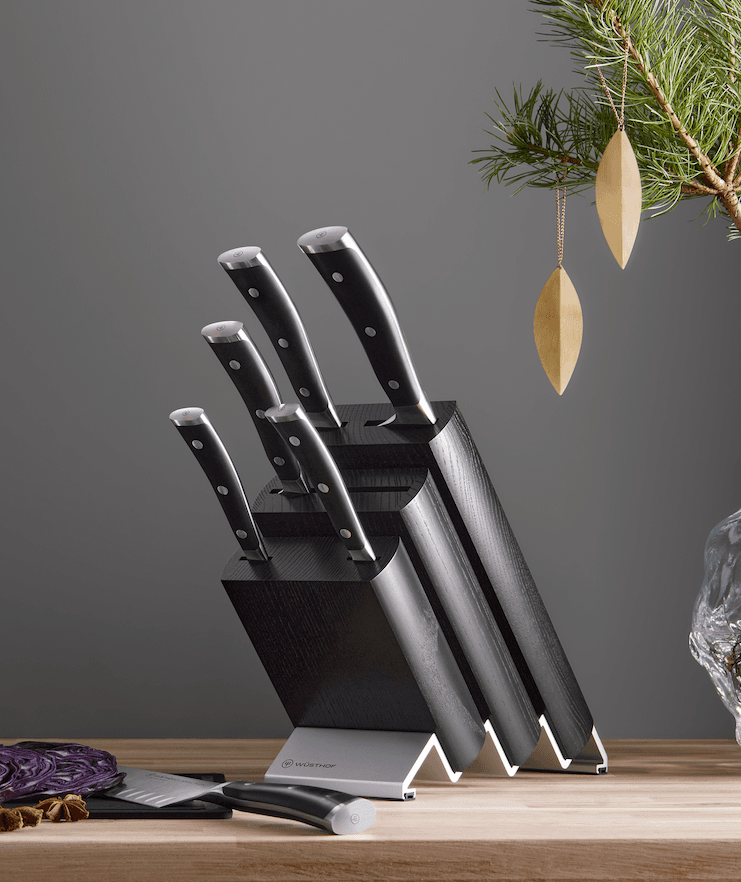 Black knife block near ornamented tree