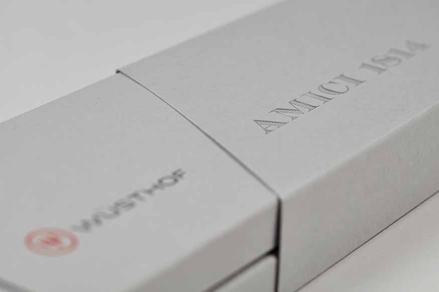 Detail image of the Amici 1814 packaging with logos